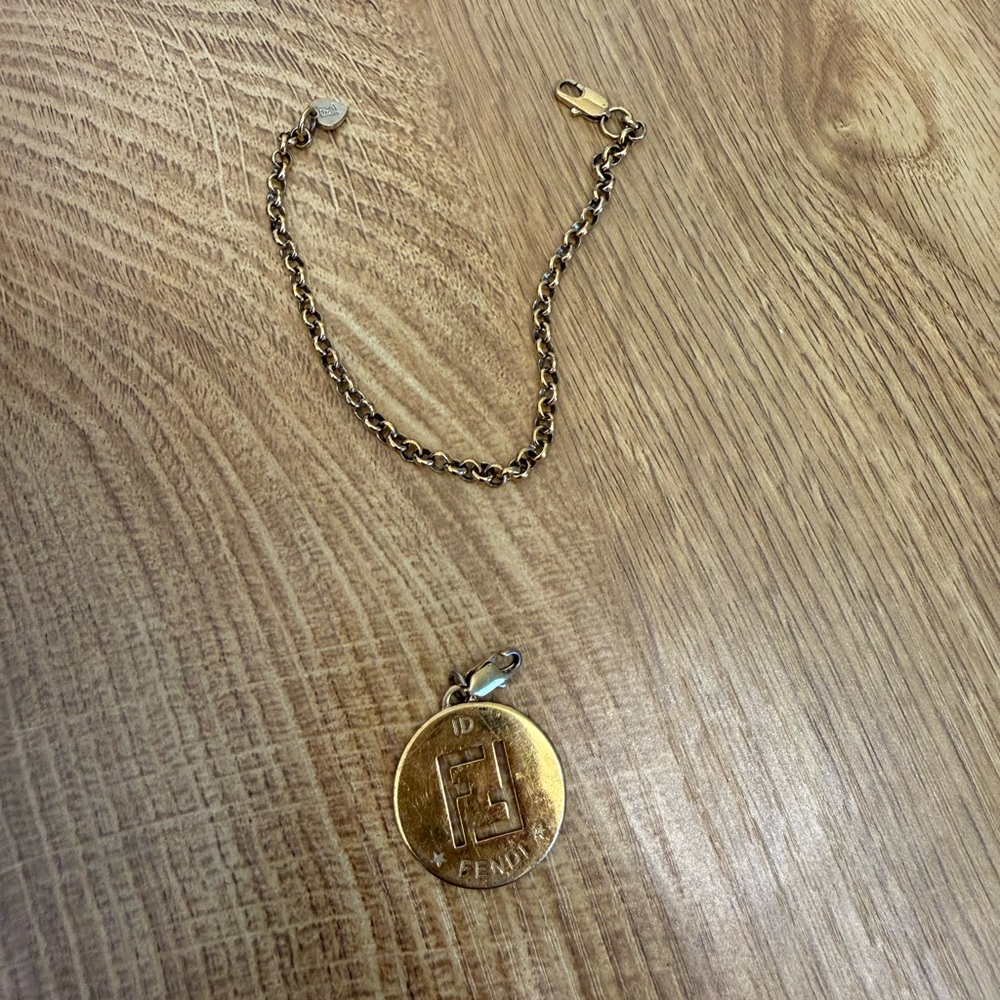 Fendi
Fendi FF Identification Gold Tone Charm
Bracelet - Picture 6 of 7